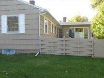 Painted fence to match house