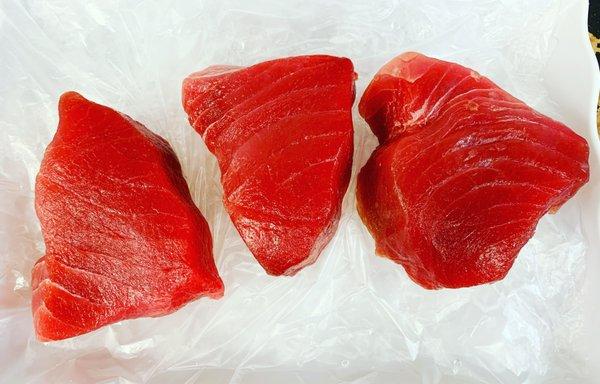 Hand cut daily! Our fresh Ahi Tuna steaks are ready for your kitchen!