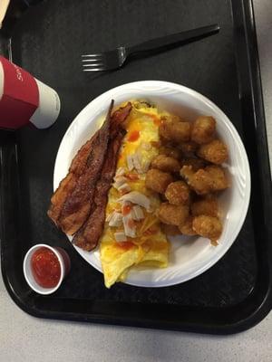 Turkey and Cheese omelet, crispy bacon and tater tots. Looks pretty decent for hospital food.