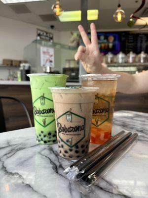 Honeydew/jasmine milk tea, horchata milk tea, mango tea