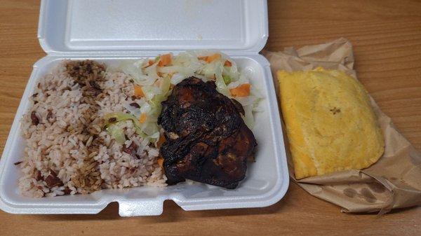 Jerked chicken (small) with steamed veggies,  rice and peas, and beef patty - about $12