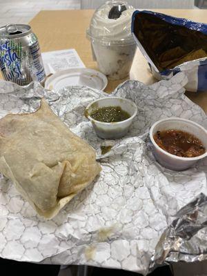 Bean, rice and cheese burrito, green and red salsas from salsa bar, and Oreo pudding dessert.