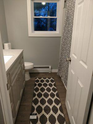 Renovated bathroom in Oswego Apartments on 5th ave