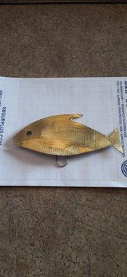 A brass gold fish