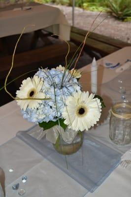 Table flowers for a reception at a wedding we attended.