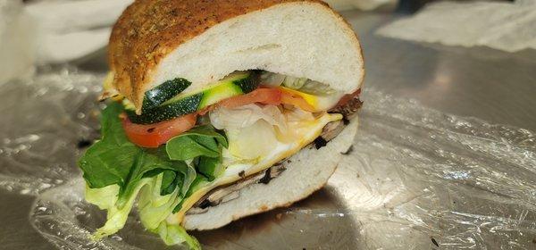 Vegetarian: Portobello Zucchini and Squash with 3 cheese Swiss, Colby Jack, and Cheddar!
 Spinach, Lettuce, Tomato