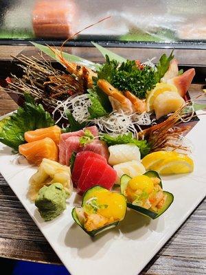 All sashimi: Ika, Taki, Quail Egg, Sake, Toro, Hamachi, Ama Ebi, Hokkigai, Ahi