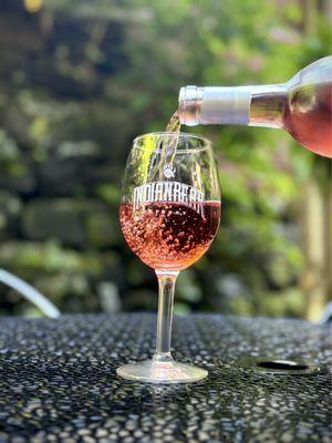 Enjoy a glass of wine in the secret garden