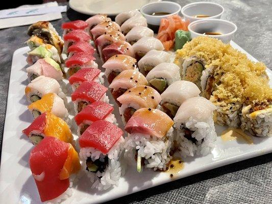 Left to right: Ultimate Rainbow Roll, Cherry Blossom Roll Special, Sakura Drop Roll, Lotus Blossom Roll Special, Famous Roll Special