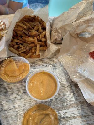 Housemade French Fries  ; Side of Hot Sauce Ketchup Aioli