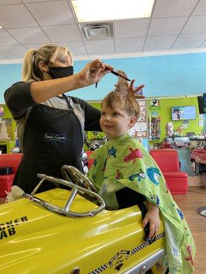 He's getting his haircut and he is smiling. They are miracle workers.