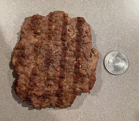 Thin burger patty.