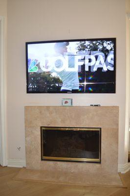 installation of 55 inch smart 4K QLED above fire place in the master bedroom, All wires and cables conceal in-wall.