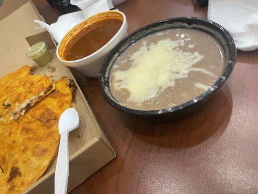 Side of Mexican Re fried Beans. Birria Consome.  Both good. Consome could use something though.  Spice of some kind. Shrug.