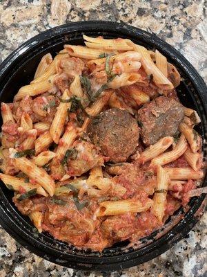 Sausage penne a la vodka with dense meatballs ordered on the side