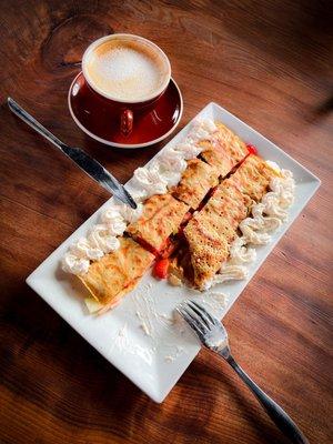 Vegan crepe with bananas,strawberries,apples..with oat whipped crème...Vanilla oat latte