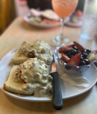 Eggs Benedict country style with biscuits n gravy !