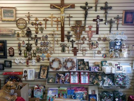 Wall crosses and crucifixes, holy water fonts, wall figures and plaques.