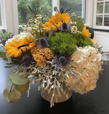 One of 6 beautiful arrangements for each table