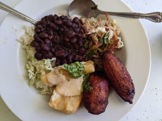 Lechon plate, yucas fritas, maduros