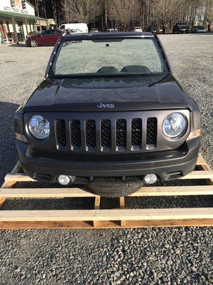 Yes we ship! This 2016 Jeep Patriot Front End Assembly left for IL today.