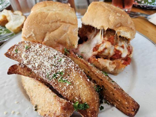 Meatball sandwich with vesuvio potatoes