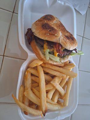 Bacon cheeseburger with fries and a small drink $17.74 plus . 75¢ fee for card  Pretty pricey burger