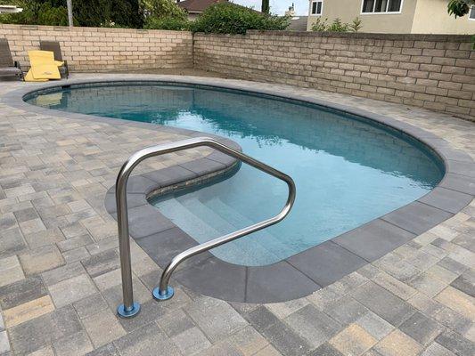 renovated pool with micro-tech pebbles which don't hurt the kids feet  and new decking