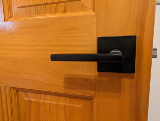 Flat black lever sets for interior doors supplied by Pat's and installed by Tony