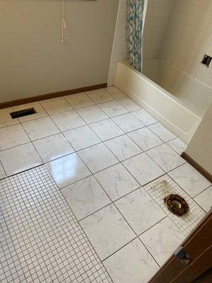 Bathroom tile flooring.