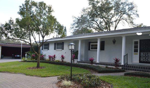 Complete front yard renovation including plant,mulch,weed fabric installation and tree thin out. Whole house was also pressure washed by us.