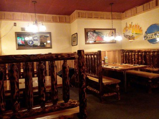 Part of the cozy, rustic smaller dining room. It hosts 5 spacious booths.