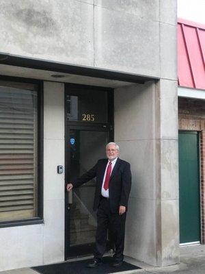 Lloyd Kelso in front of the office where it all started in 1978.