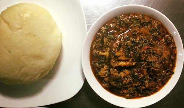 Egusi soup with yam fufu