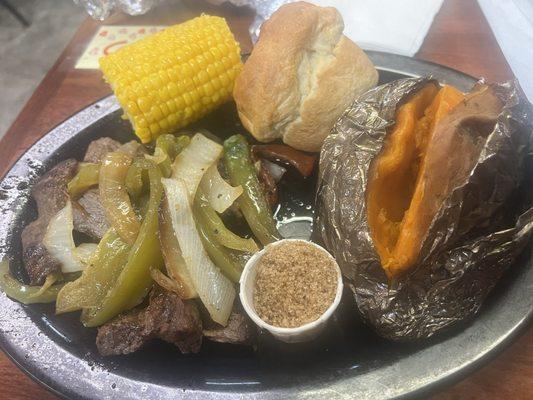 Sirloin tips with corn and baked sweet potato