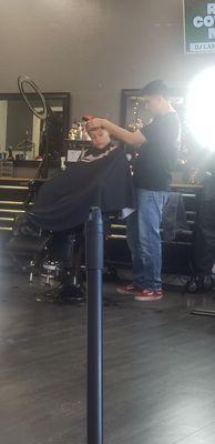 Our son getting an over due cut