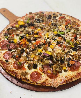 When you can't pick just one get all. the toppings with our supreme pizza