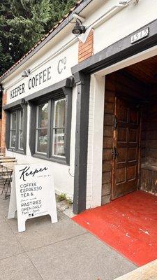 Store front with amazing wood door