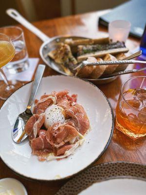 Soft poached duck egg and wood oven-roasted bone marrow