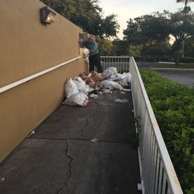 This is the HOA president cleaning up his mess -- Since the HOA didn't apparently pay the bills --- the waste company took the dumpster away