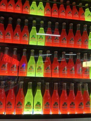 Close up of the Jarritos tacos sign