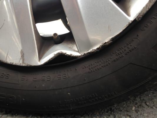 Condition of wheel on car being picked up - considered "normal wear and tear"