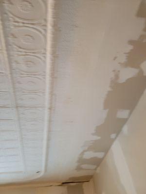 damaged antique metal celling