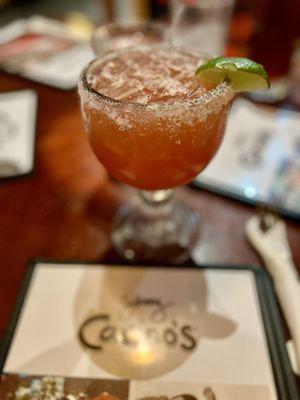 Blood Orange Margarita on the rocks with Salt on the rim.