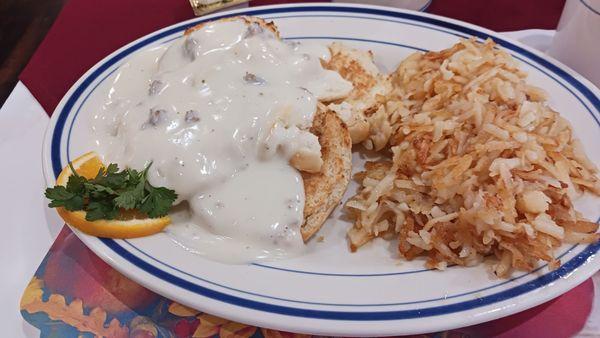 Biscuits and gravy with hashbrowns.