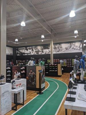 Indoor track in the footwear section where you can try on and purchase sneakers.