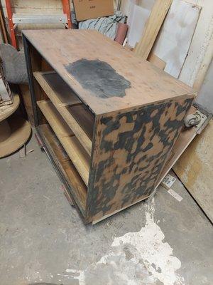 Before picture of an art deco dresser