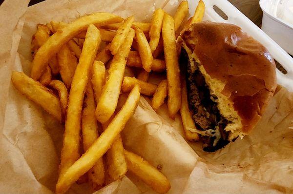 French fries and a mushroom Swiss burger.