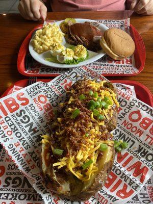 Brisket baked potato- Brisket plate with Mac and cheese and stuffed eggs