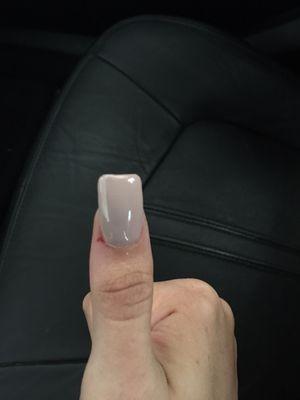 The thumb cut, horrible shape, and on one of my nails she didn't even paint the whole nail